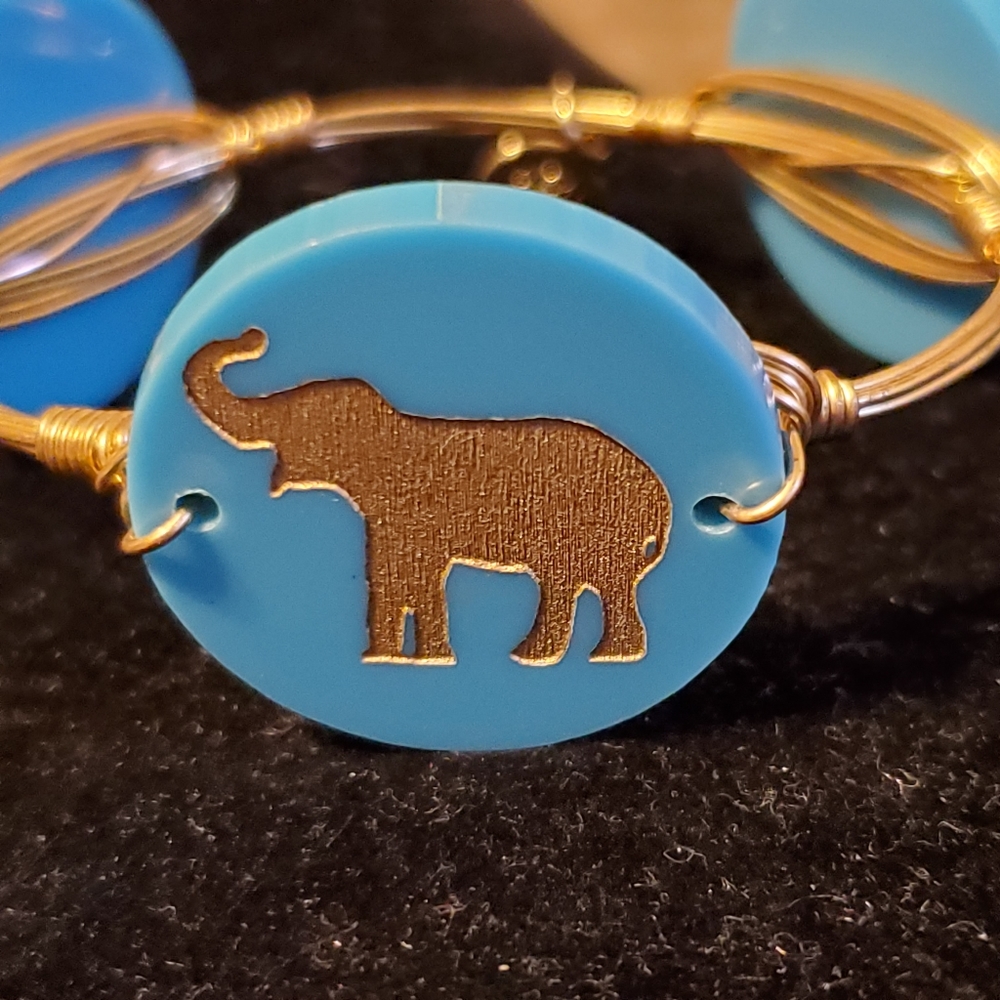 Moon and Lola goldtone wire wrap bangle bracelet with elephants